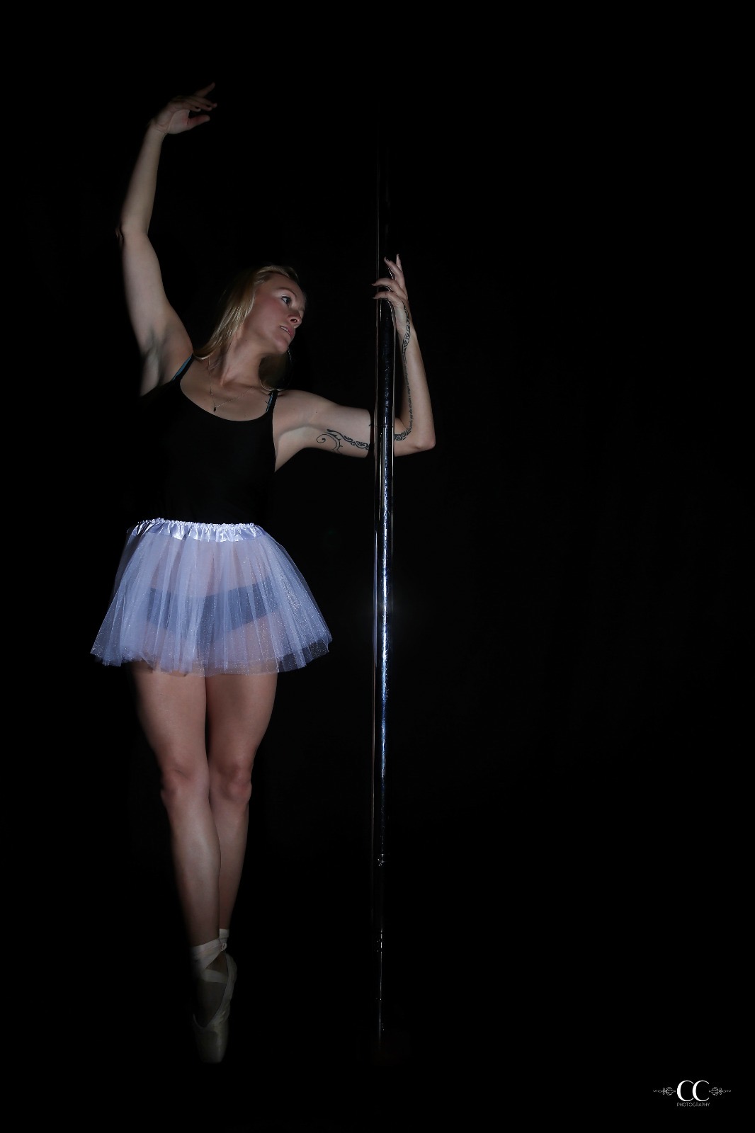 Aerial pole performer in a tutu, Nautical Aerial & Fitness Studio