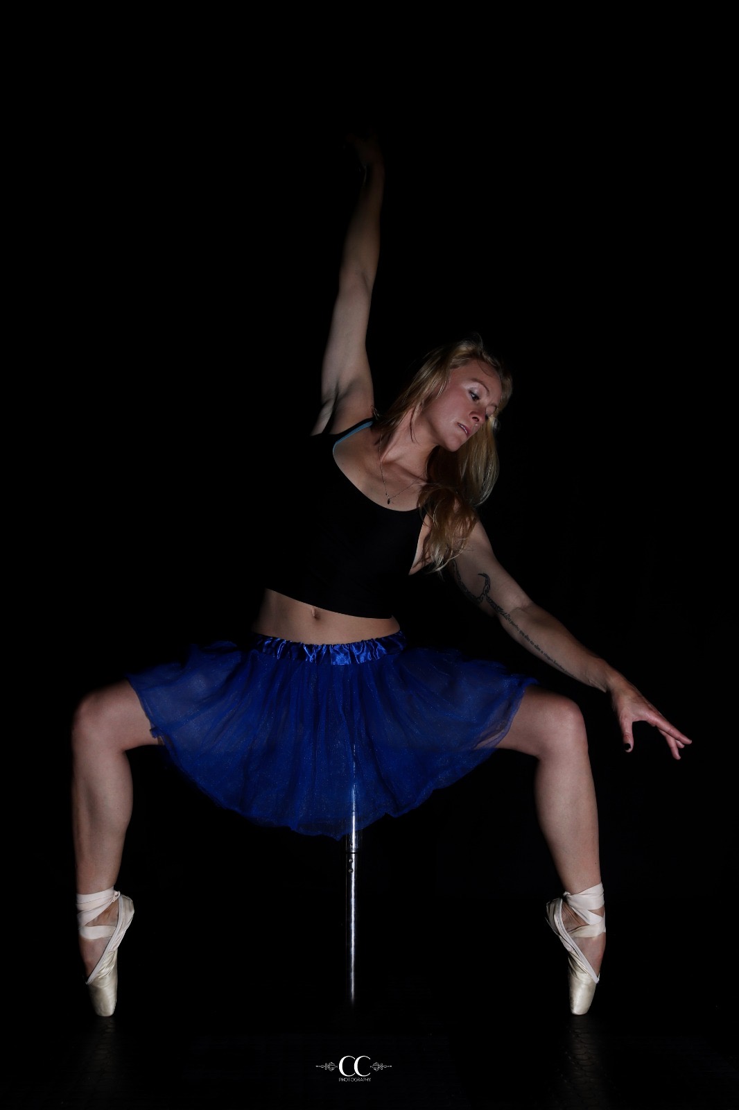 Aerial pole performer in a tutu, Nautical Aerial & Fitness Studio